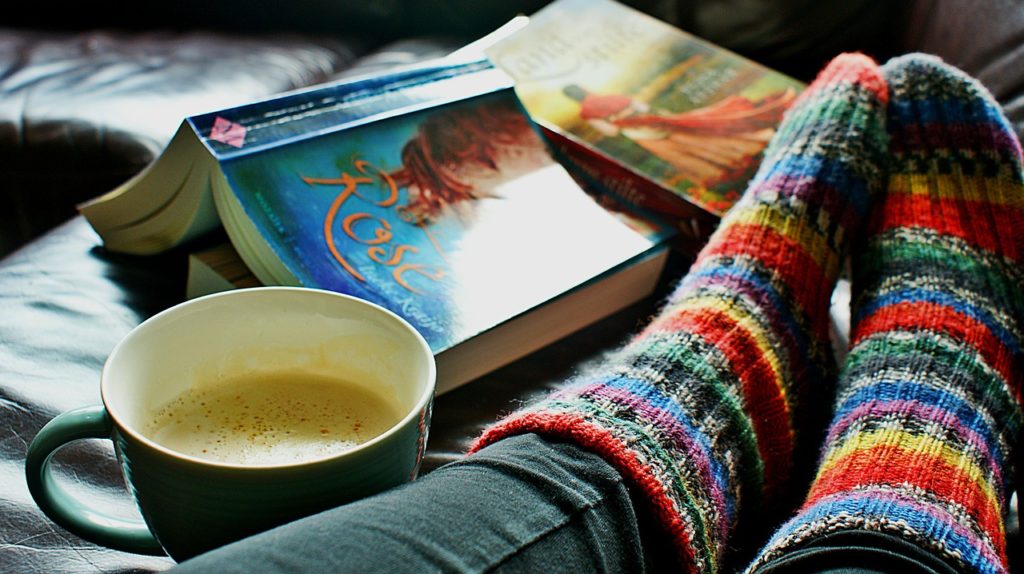 book, coffe and rainbow socks